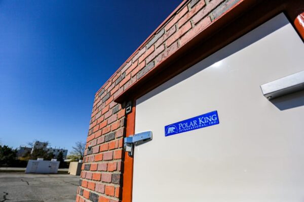 Polar King door in white with brick lined exterior