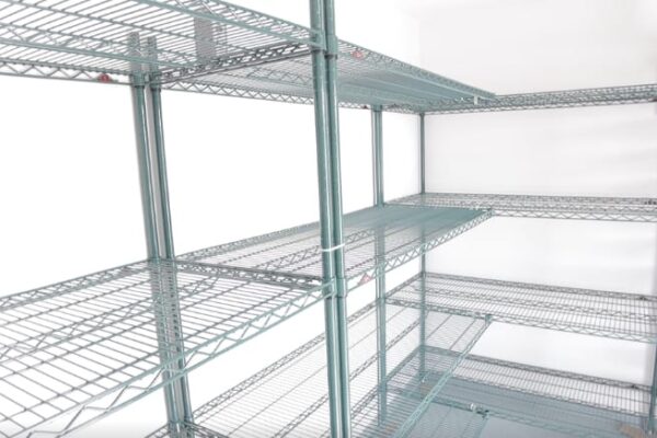 Metal shelving in a Polar King walk-in cooler freezer