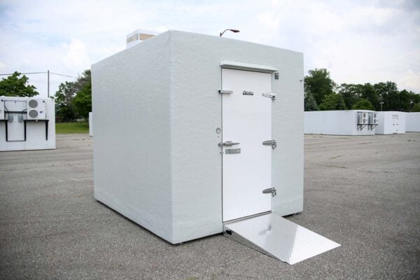 White Polar King freezer unit outside on concrete