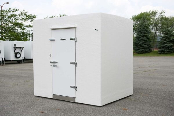 White Polar King walk-in freezer unit on a sunny day