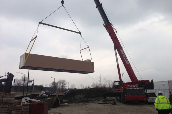 Polar King cooler unit being lifted down on a crane