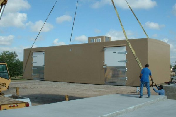 Tan Polar King walk-in cooler unit being delivered