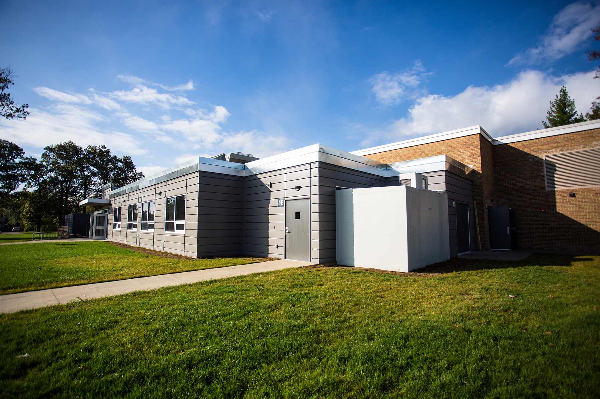Polar King walk-in cooler attached to building